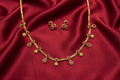 Antique Gold Ruby Red Stone Necklace Set on Red Silk