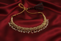 Gold Choker on Red Silk