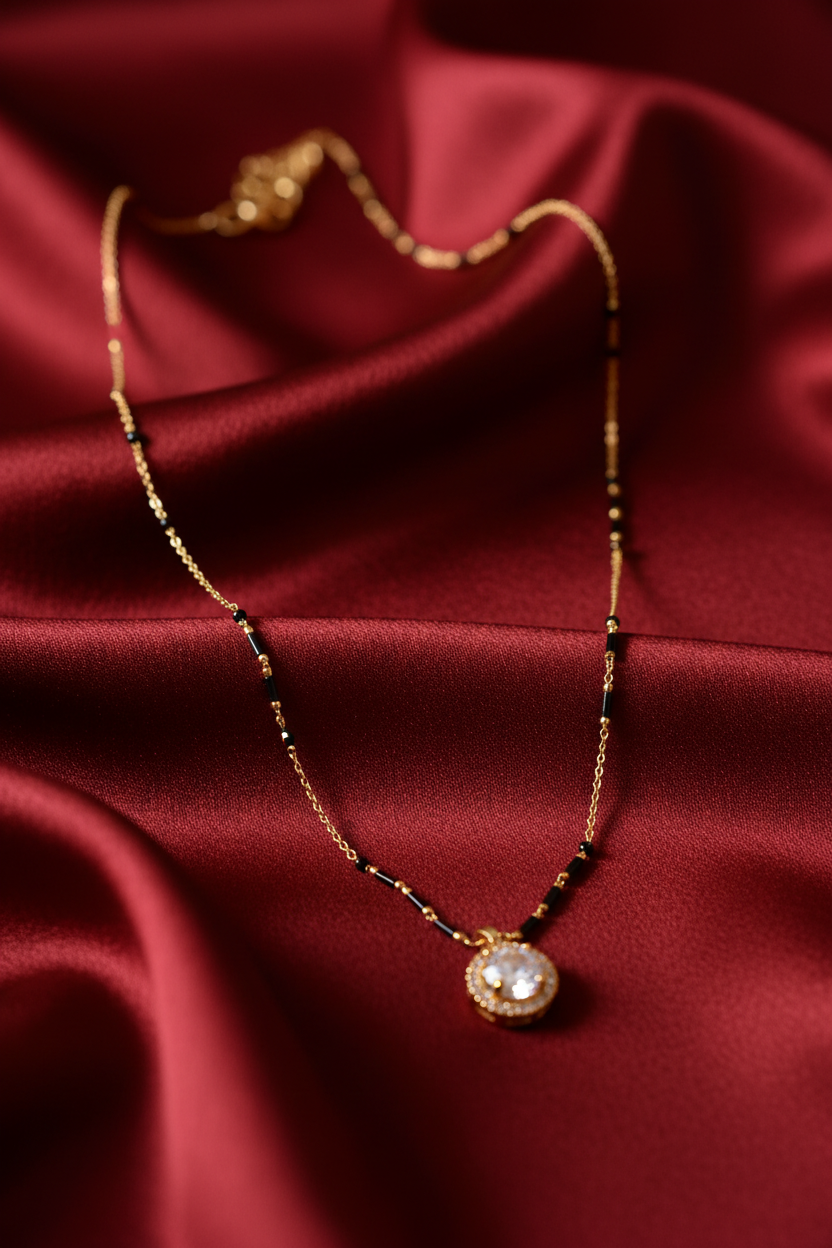 Gold Crystal Solitaire Necklace on Red Silk