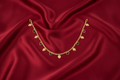 Gold Leaf & Multicolor Stone Necklace on Red Silk