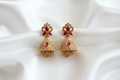 Gold Ruby CZ Pave Jhumka Earrings on White Silk
