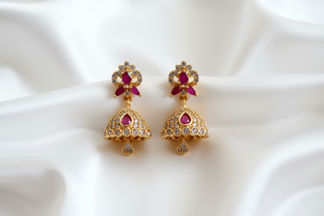 Gold Ruby CZ Pave Jhumka Earrings on White Silk