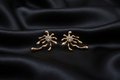 Gold Sunburst CZ Earrings on Black Silk