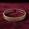 Gold-Tone Crystal Edge Bangle on Velvet