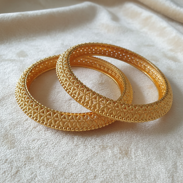 Gold-Tone Filigree Wire Weave Bangle Set on Ivory Velvet