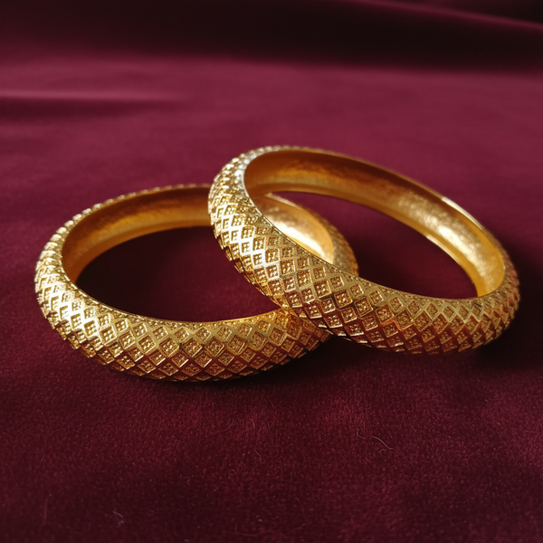 Gold-Tone Solid Dome Bangle Set on Maroon Velvet