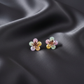 Pastel Iridescent Sequin Flower Stud Earrings on Dark Charcoal Silk