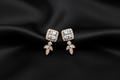 Rose Gold Crystal Halo Leaf Drop Earrings on Black Silk